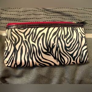 FREE w/$35 purchase - Zebra print makeup bag